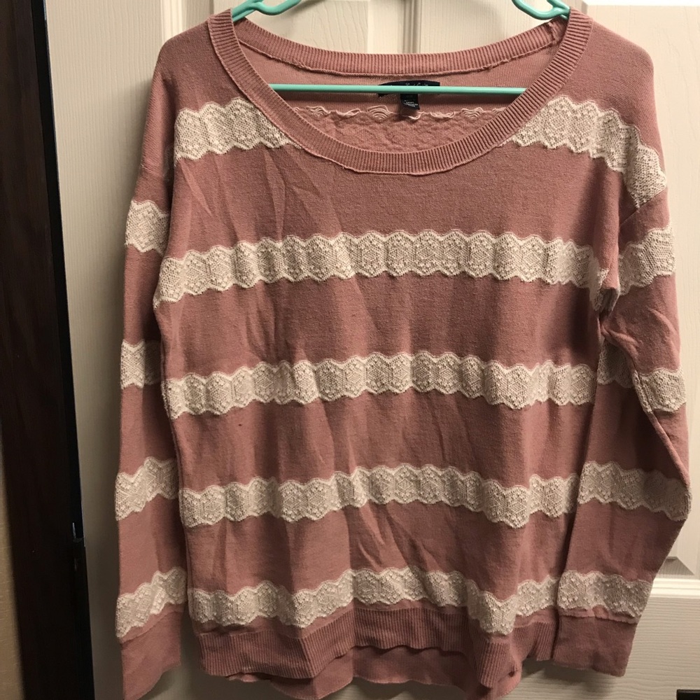 Sweater with crochet inset